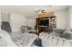 Stylish living room with modern entertainment center and comfortable seating at 9161 Rolling Sky Dr, Las Vegas, NV 89178