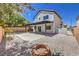 Large backyard has patio, pergola, and stone landscaping at 9321 Dancing Daffodil Ave, Las Vegas, NV 89129