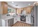 Modern kitchen with stainless steel appliances, and light-colored cabinets at 9321 Dancing Daffodil Ave, Las Vegas, NV 89129