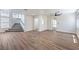 Bright and airy living room showcasing beautiful floors and an open staircase at 9321 Dancing Daffodil Ave, Las Vegas, NV 89129