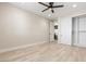 Spacious bedroom with hardwood floors, closet, and neutral walls at 9865 Bright Angel Way, Las Vegas, NV 89149