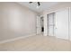 A modern bedroom with an open closet and en-suite bathroom at 9865 Bright Angel Way, Las Vegas, NV 89149