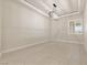 Bright, spacious bedroom with tile floors, recessed lighting, and plantation shutters at 9865 Bright Angel Way, Las Vegas, NV 89149