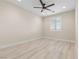 Bright, neutral bedroom with hardwood floors, recessed lighting, and ceiling fan at 9865 Bright Angel Way, Las Vegas, NV 89149