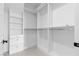 A walk-in closet with custom shelving and storage solutions at 9865 Bright Angel Way, Las Vegas, NV 89149