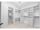 Large walk-in closet with custom storage solutions offers organization and style at 9865 Bright Angel Way, Las Vegas, NV 89149