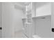 Spacious walk-in closet featuring custom shelving, drawers, and ample storage space at 9865 Bright Angel Way, Las Vegas, NV 89149
