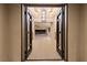 Elegant foyer featuring double doors, recessed lighting, and views through to the pool at 9865 Bright Angel Way, Las Vegas, NV 89149