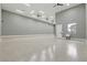 Spacious garage featuring RV hookups, bright lighting, and neutral tones, offering versatile space for vehicles and projects at 9865 Bright Angel Way, Las Vegas, NV 89149
