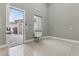 Well-lit garage with epoxy floors and a utility sink, offers easy access to the outdoor patio space at 9865 Bright Angel Way, Las Vegas, NV 89149