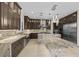 Gourmet kitchen featuring stainless steel appliances and a large island at 9865 Bright Angel Way, Las Vegas, NV 89149