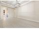 Bright living room with a tray ceiling and direct view of Kitchen at 9865 Bright Angel Way, Las Vegas, NV 89149