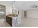 Open-concept living space with marble countertops and sleek cabinetry at 9865 Bright Angel Way, Las Vegas, NV 89149
