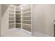 Walk-in pantry provides ample storage space with custom shelving at 9865 Bright Angel Way, Las Vegas, NV 89149