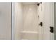 Modern shower featuring white marble tiling, and glass door at 9865 Bright Angel Way, Las Vegas, NV 89149