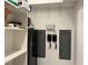 Utility room with ample storage shelves, and electrical panels at 9865 Bright Angel Way, Las Vegas, NV 89149