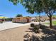 A community park with a playground, picnic tables, and well-maintained landscaping for outdoor enjoyment at 987 Wembly Hills Pl, Henderson, NV 89011