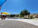 Community playground featuring a splash pad and shaded seating area for children and families at 987 Wembly Hills Pl, Henderson, NV 89011
