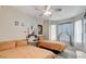 Comfortable bedroom featuring two cozy beds and a ceiling fan for added ventilation at 9975 Peace Way # 1069, Las Vegas, NV 89147
