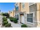 Charming condo exterior with well-maintained landscaping and a welcoming entrance at 9975 Peace Way # 1069, Las Vegas, NV 89147
