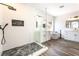 Luxurious bathroom with a glass shower, a soaking tub, and dual vanities at 1016 Eaglewood Dr, Las Vegas, NV 89144