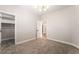 Cozy bedroom with carpet flooring, closet with organizers and modern lighting at 1016 Eaglewood Dr, Las Vegas, NV 89144
