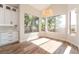 Cozy dining area with large windows providing plenty of natural light and backyard views at 1016 Eaglewood Dr, Las Vegas, NV 89144
