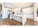 Modern kitchen with a large island, stainless steel appliances, and plenty of cabinet storage space at 1016 Eaglewood Dr, Las Vegas, NV 89144