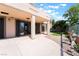 Outdoor patio with concrete, rock detail, and a large sliding glass door to the home at 1016 Eaglewood Dr, Las Vegas, NV 89144
