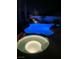 A brightly lit pool and spa provides an inviting outdoor experience at night at 1016 Eaglewood Dr, Las Vegas, NV 89144