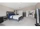 Extremely spacious primary bedroom featuring modern decor and providing plenty of room for creativity at 10329 Walworth Ave, Las Vegas, NV 89166