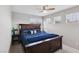 Well-lit bedroom featuring a ceiling fan and sizable windows providing natural light and external views at 10329 Walworth Ave, Las Vegas, NV 89166