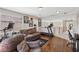 Spacious bonus room with seating area, exercise equipment, and access to the rest of the home at 10329 Walworth Ave, Las Vegas, NV 89166