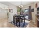 Bright dining area with access to backyard through sliding glass door at 10329 Walworth Ave, Las Vegas, NV 89166