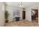 Inviting dining room with a window view, stylish furniture, and easy access to the kitchen at 10329 Walworth Ave, Las Vegas, NV 89166