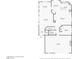 Detailed floor plan showcasing the layout of the first floor, including kitchen, living spaces, and garage at 10329 Walworth Ave, Las Vegas, NV 89166