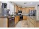 Beautiful kitchen with stainless steel appliances, modern countertops, and ample cabinet space at 10329 Walworth Ave, Las Vegas, NV 89166