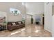 Spacious living room featuring high ceilings, lots of natural light and tile floors at 10329 Walworth Ave, Las Vegas, NV 89166