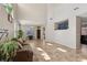 Living room with high ceilings, tile flooring, recessed lighting, and lots of natural light at 10329 Walworth Ave, Las Vegas, NV 89166
