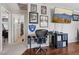 Office space featuring wooden floors, decor, and a nearby bathroom at 10329 Walworth Ave, Las Vegas, NV 89166