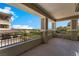 Large covered balcony providing scenic views of the surrounding mountains and desert landscape at 128 Los Cabos Dr # 301, Las Vegas, NV 89144