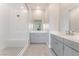 Contemporary bathroom with a glass shower and double sink vanity at 128 Los Cabos Dr # 301, Las Vegas, NV 89144