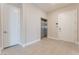 Hallway featuring an elevator, and two doors on opposite sides of each other at 128 Los Cabos Dr # 301, Las Vegas, NV 89144