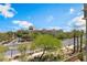 Beautiful exterior view of the building showcasing manicured landscaping and architectural design under a blue sky at 128 Los Cabos Dr # 301, Las Vegas, NV 89144