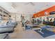 Well-equipped gym with treadmills, weights, and mirrors for a complete workout experience at 128 Los Cabos Dr # 301, Las Vegas, NV 89144