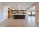 Spacious, modern kitchen featuring an island, stainless appliances, and ample cabinet space at 128 Los Cabos Dr # 301, Las Vegas, NV 89144