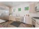 Bright kitchen featuring modern stainless steel appliances, white countertops, and sleek cabinetry at 128 Los Cabos Dr # 301, Las Vegas, NV 89144