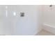 Close-up of a tiled shower featuring a built-in bench and modern fixtures at 128 Los Cabos Dr # 301, Las Vegas, NV 89144