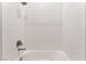 Clean, bright shower with white subway tile, contemporary fixtures, and a built-in tub at 128 Los Cabos Dr # 301, Las Vegas, NV 89144