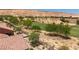 Overhead shot of a backyard abutting a golf course in a desert community at 1407 Wheelwright Ct, Mesquite, NV 89034